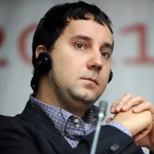 Андрей Романенко